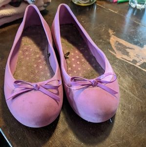 Pink croc slip on shoes